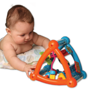 Baby playing with a toy during tummy time