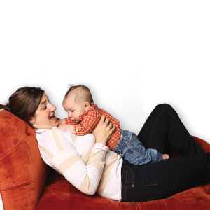Parent holding baby against their chest